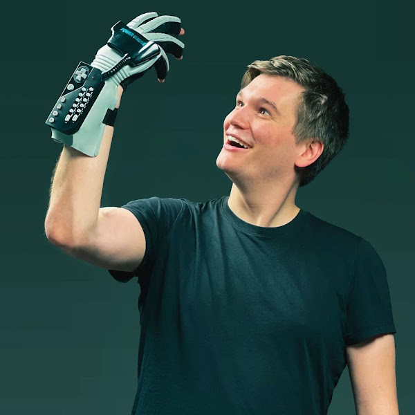 dakota wearing a nintendo powerglove